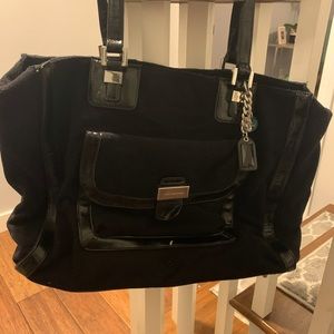 Black Juicy Couture. Holds laptop. Great bag for travel. Holds everything!